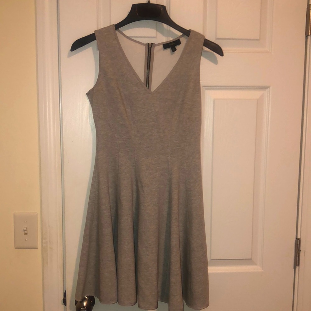 Maia flirty heather gray dress has a long zipper on the back